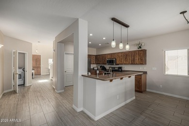 Beautiful 4-bedroom, 3-bath home in Johnson Ranch, on an on The Golf Club At Johnson Ranch in Arizona - for sale on GolfHomes.com, golf home, golf lot