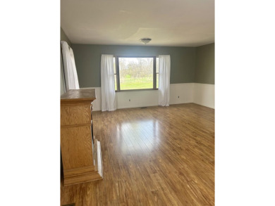 Very nice home with a HUGE living room addition with gas on Cascades Golf Course in Michigan - for sale on GolfHomes.com, golf home, golf lot