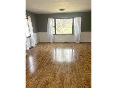 Very nice home with a HUGE living room addition with gas on Cascades Golf Course in Michigan - for sale on GolfHomes.com, golf home, golf lot