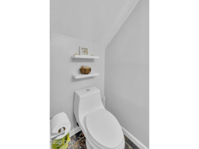 Well-Maintained Canal-Front Townhome with Spacious BackyardThis on Edgewater Beach Resort in Florida - for sale on GolfHomes.com, golf home, golf lot