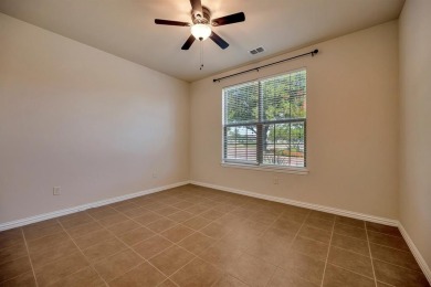 This beautifully maintained corner lot half duplex home is on Wildhorse Golf Club of Robson Ranch in Texas - for sale on GolfHomes.com, golf home, golf lot