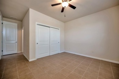 This beautifully maintained corner lot half duplex home is on Wildhorse Golf Club of Robson Ranch in Texas - for sale on GolfHomes.com, golf home, golf lot
