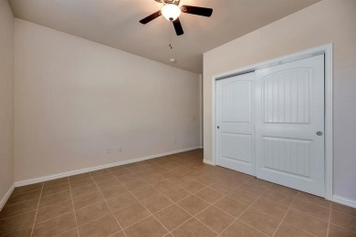 This beautifully maintained corner lot half duplex home is on Wildhorse Golf Club of Robson Ranch in Texas - for sale on GolfHomes.com, golf home, golf lot