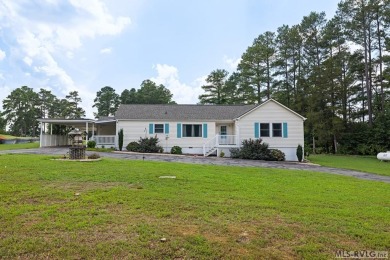 Welcome to your dream home, nestled on hole 9 of the prestigious on Tanglewood Shores Golf and Country Club in Virginia - for sale on GolfHomes.com, golf home, golf lot