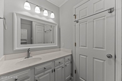 Escape to your own one-bedroom condo in a peaceful resort-style on Harbour Point Golf Club in North Carolina - for sale on GolfHomes.com, golf home, golf lot