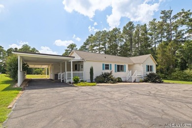 Welcome to your dream home, nestled on hole 9 of the prestigious on Tanglewood Shores Golf and Country Club in Virginia - for sale on GolfHomes.com, golf home, golf lot