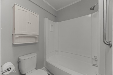 Escape to your own one-bedroom condo in a peaceful resort-style on Harbour Point Golf Club in North Carolina - for sale on GolfHomes.com, golf home, golf lot