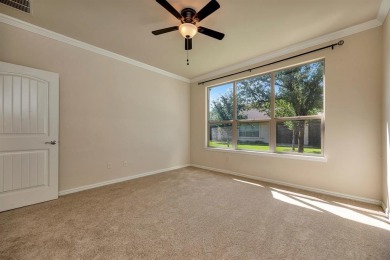 This beautifully maintained corner lot half duplex home is on Wildhorse Golf Club of Robson Ranch in Texas - for sale on GolfHomes.com, golf home, golf lot