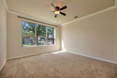 This beautifully maintained corner lot half duplex home is on Wildhorse Golf Club of Robson Ranch in Texas - for sale on GolfHomes.com, golf home, golf lot