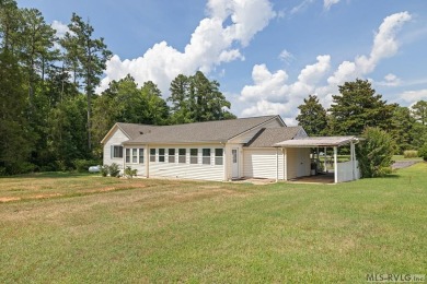 Welcome to your dream home, nestled on hole 9 of the prestigious on Tanglewood Shores Golf and Country Club in Virginia - for sale on GolfHomes.com, golf home, golf lot