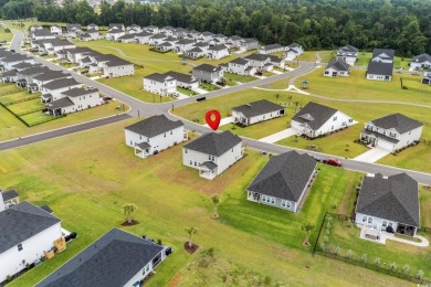 Welcome to this beautifully designed 5-bedroom, 3-bathroom home on The Members Club At Grande Dunes in South Carolina - for sale on GolfHomes.com, golf home, golf lot