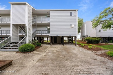 Escape to your own one-bedroom condo in a peaceful resort-style on Harbour Point Golf Club in North Carolina - for sale on GolfHomes.com, golf home, golf lot