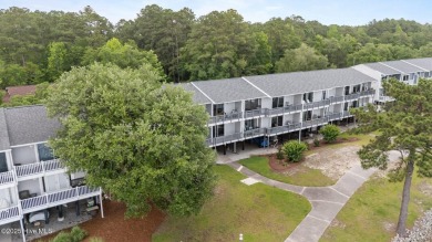Escape to your own one-bedroom condo in a peaceful resort-style on Harbour Point Golf Club in North Carolina - for sale on GolfHomes.com, golf home, golf lot