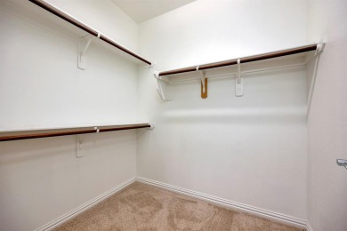 This beautifully maintained corner lot half duplex home is on Wildhorse Golf Club of Robson Ranch in Texas - for sale on GolfHomes.com, golf home, golf lot