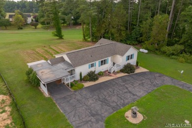 Welcome to your dream home, nestled on hole 9 of the prestigious on Tanglewood Shores Golf and Country Club in Virginia - for sale on GolfHomes.com, golf home, golf lot