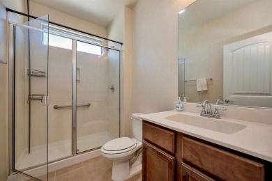 This beautifully maintained corner lot half duplex home is on Wildhorse Golf Club of Robson Ranch in Texas - for sale on GolfHomes.com, golf home, golf lot