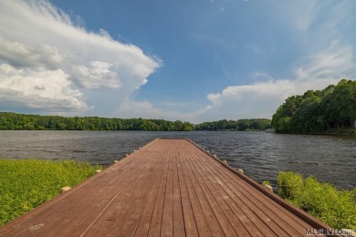 Welcome to your dream home, nestled on hole 9 of the prestigious on Tanglewood Shores Golf and Country Club in Virginia - for sale on GolfHomes.com, golf home, golf lot