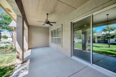 This beautifully maintained corner lot half duplex home is on Wildhorse Golf Club of Robson Ranch in Texas - for sale on GolfHomes.com, golf home, golf lot