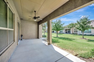 This beautifully maintained corner lot half duplex home is on Wildhorse Golf Club of Robson Ranch in Texas - for sale on GolfHomes.com, golf home, golf lot