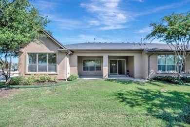 This beautifully maintained corner lot half duplex home is on Wildhorse Golf Club of Robson Ranch in Texas - for sale on GolfHomes.com, golf home, golf lot