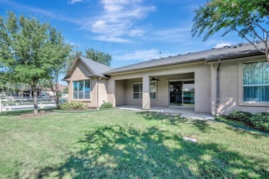 This beautifully maintained corner lot half duplex home is on Wildhorse Golf Club of Robson Ranch in Texas - for sale on GolfHomes.com, golf home, golf lot