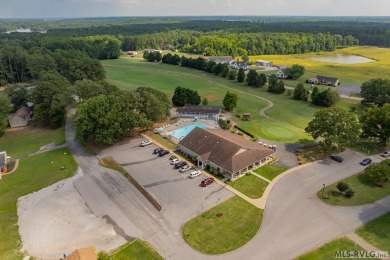 Welcome to your dream home, nestled on hole 9 of the prestigious on Tanglewood Shores Golf and Country Club in Virginia - for sale on GolfHomes.com, golf home, golf lot