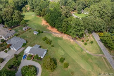 Welcome to your dream home, nestled on hole 9 of the prestigious on Tanglewood Shores Golf and Country Club in Virginia - for sale on GolfHomes.com, golf home, golf lot