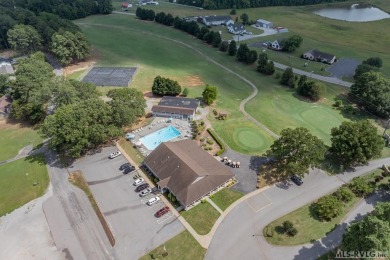 Welcome to your dream home, nestled on hole 9 of the prestigious on Tanglewood Shores Golf and Country Club in Virginia - for sale on GolfHomes.com, golf home, golf lot