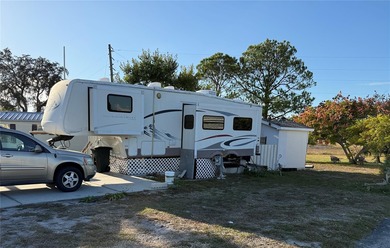 61x162x132 Deeded Lot, 50x10 Cement Pad with 12x24 Patio, 2005 on Glen Lakes Country Club in Florida - for sale on GolfHomes.com, golf home, golf lot