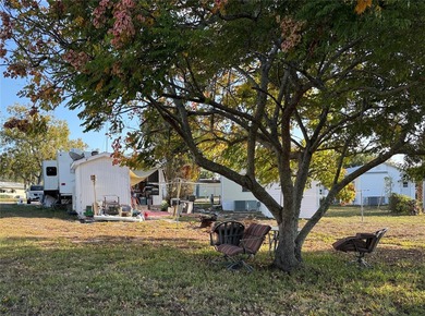 61x162x132 Deeded Lot, 50x10 Cement Pad with 12x24 Patio, 2005 on Glen Lakes Country Club in Florida - for sale on GolfHomes.com, golf home, golf lot