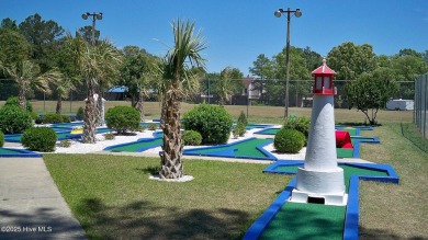 Escape to your own one-bedroom condo in a peaceful resort-style on Harbour Point Golf Club in North Carolina - for sale on GolfHomes.com, golf home, golf lot