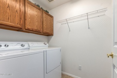 Step into this lovely 2-bedroom, 2-bath home nestled in the on Coyote Lakes Golf Club in Arizona - for sale on GolfHomes.com, golf home, golf lot