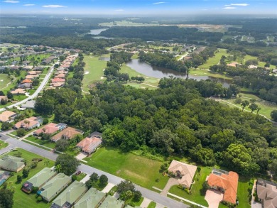 Discover the perfect canvas for your dream home in this on Lake Jovita Golf and Country Club in Florida - for sale on GolfHomes.com, golf home, golf lot