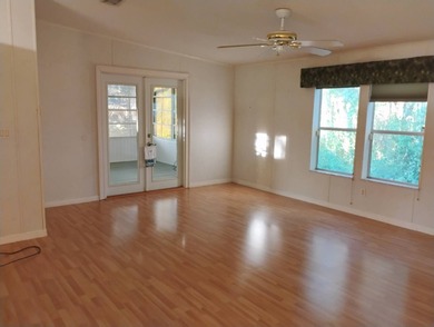 Over 1200 sq. ft. of comfortable living with a 1 car garage on Ocala Palms Golf and Country Club in Florida - for sale on GolfHomes.com, golf home, golf lot