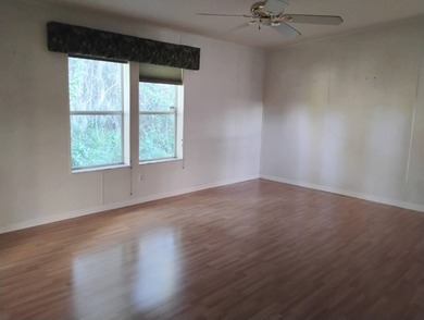 Over 1200 sq. ft. of comfortable living with a 1 car garage on Ocala Palms Golf and Country Club in Florida - for sale on GolfHomes.com, golf home, golf lot