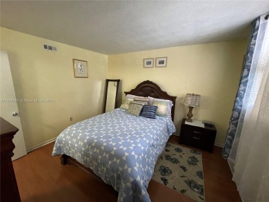 Welcome to this beautifully updated 2-bedroom, 2-bath apartment on Pembroke Lakes Golf Club in Florida - for sale on GolfHomes.com, golf home, golf lot