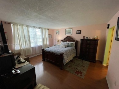 Welcome to this beautifully updated 2-bedroom, 2-bath apartment on Pembroke Lakes Golf Club in Florida - for sale on GolfHomes.com, golf home, golf lot