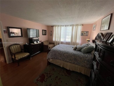 Welcome to this beautifully updated 2-bedroom, 2-bath apartment on Pembroke Lakes Golf Club in Florida - for sale on GolfHomes.com, golf home, golf lot