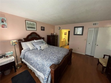 Welcome to this beautifully updated 2-bedroom, 2-bath apartment on Pembroke Lakes Golf Club in Florida - for sale on GolfHomes.com, golf home, golf lot