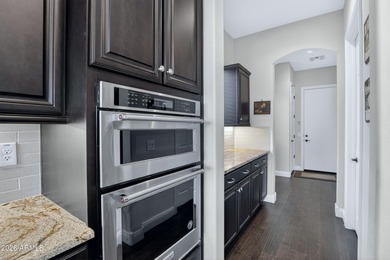 Nestled within a prestigious 55+ golf course community, this on Poston Butte Golf Club in Arizona - for sale on GolfHomes.com, golf home, golf lot