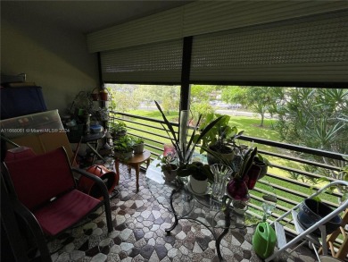 Welcome to this beautifully updated 2-bedroom, 2-bath apartment on Pembroke Lakes Golf Club in Florida - for sale on GolfHomes.com, golf home, golf lot