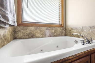 Welcome to this beautiful all-brick, single-story home in the on Deer Lake Golf Club in Missouri - for sale on GolfHomes.com, golf home, golf lot