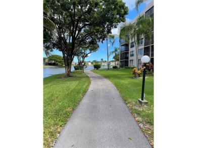 Welcome to this beautifully updated 2-bedroom, 2-bath apartment on Pembroke Lakes Golf Club in Florida - for sale on GolfHomes.com, golf home, golf lot