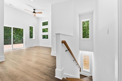 DO IT TODAY AND NOT SOMEDAY! This contemporary newly constructed on The Trail At Chickasaw Pointe in South Carolina - for sale on GolfHomes.com, golf home, golf lot