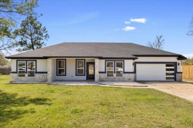 Step inside this 4 bedroom, 2 bath, with an office/flex room on Pine Forest Golf Club in Texas - for sale on GolfHomes.com, golf home, golf lot