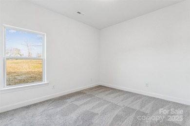 Gorgeous brand new 4 bedroom home in the lakefront golf course on Woodbridge Golf Links in North Carolina - for sale on GolfHomes.com, golf home, golf lot