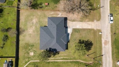 Step inside this 4 bedroom, 2 bath, with an office/flex room on Pine Forest Golf Club in Texas - for sale on GolfHomes.com, golf home, golf lot