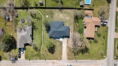 Step inside this 4 bedroom, 2 bath, with an office/flex room on Pine Forest Golf Club in Texas - for sale on GolfHomes.com, golf home, golf lot