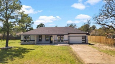 Step inside this 4 bedroom, 2 bath, with an office/flex room on Pine Forest Golf Club in Texas - for sale on GolfHomes.com, golf home, golf lot