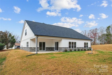 Gorgeous brand new 4 bedroom home in the lakefront golf course on Woodbridge Golf Links in North Carolina - for sale on GolfHomes.com, golf home, golf lot